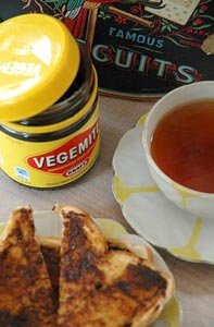 photograph of Aussie classics: vegemite and an Arnott's biscuit tin